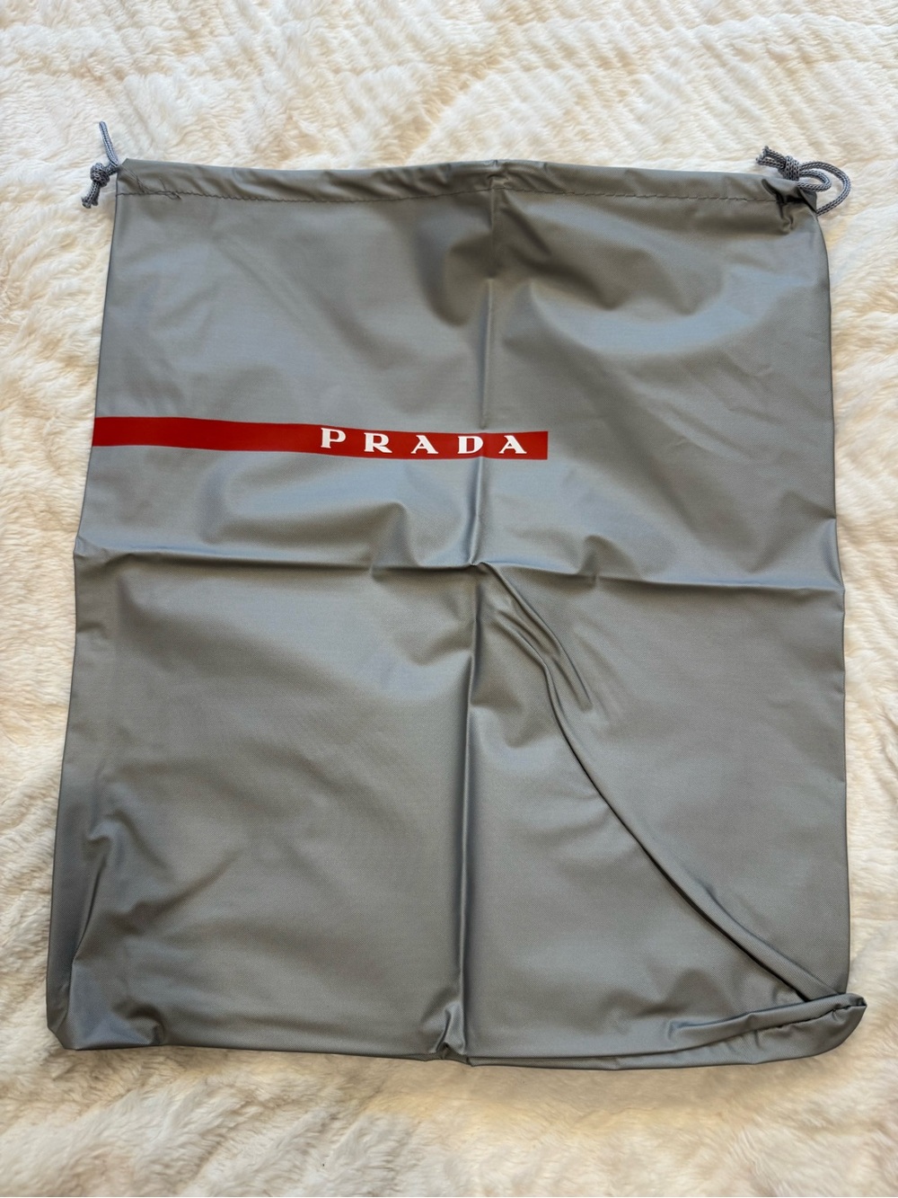 Prada Gray Drawstring Pouch with Red Logo Stripe